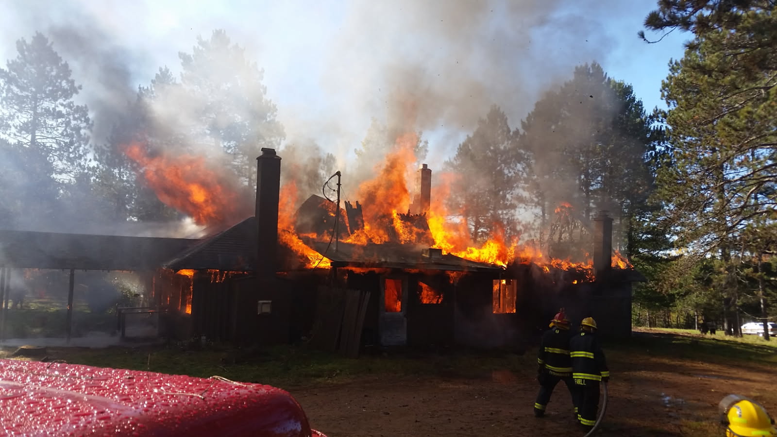 Firefighters conducting a controlled-burn training exercise